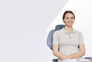 A female patient at Banyule Dental is seated in the dental chair