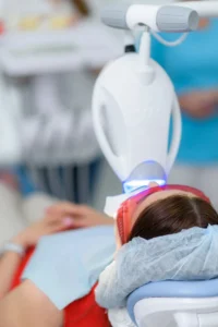 A patient of Banyule Dental is under Zoom teeth whitening